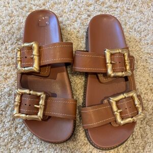Brown Schutz Sandals with Gold Buckles